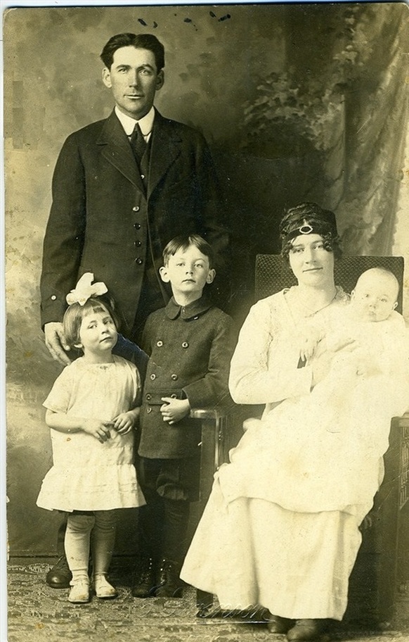 Portrait of Charles and Emily Davis with children: Emma, Peter, and baby Grace